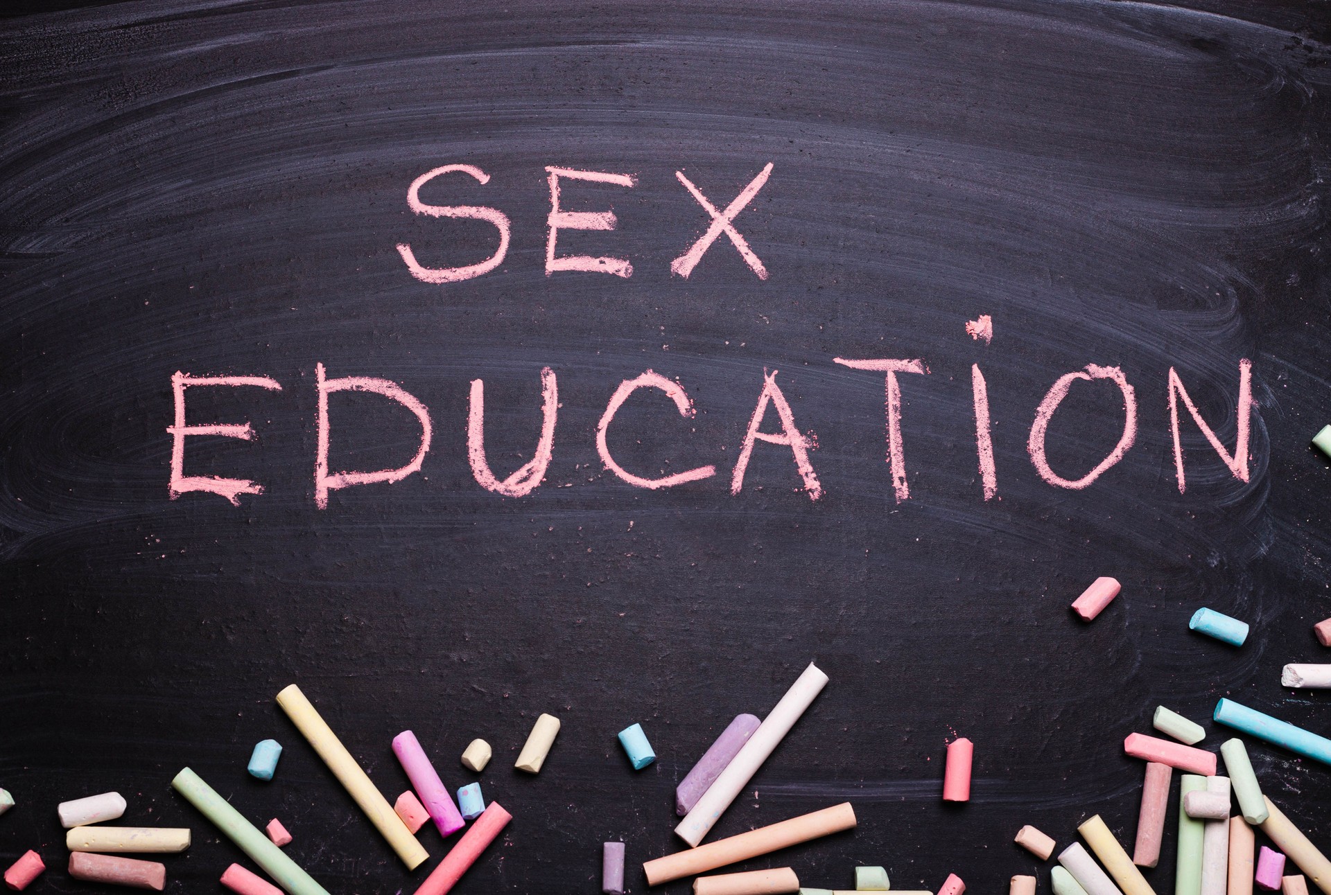 The word sex education written in chalk